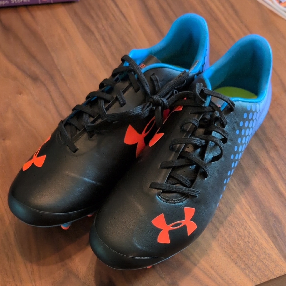 Under Armour Black and Orange Athletic Shoes with Synthetic Leather..